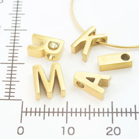 Metal parts initial K gold