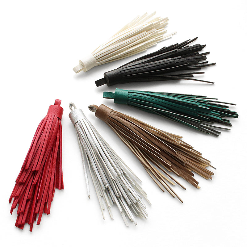 Synthetic leather random tassel green