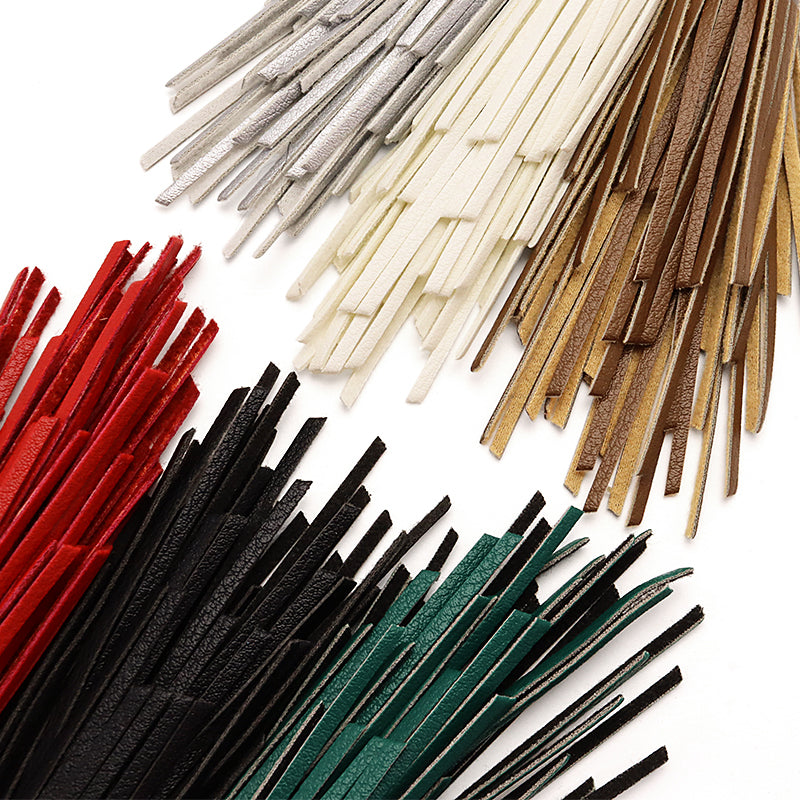 Synthetic leather random tassel green