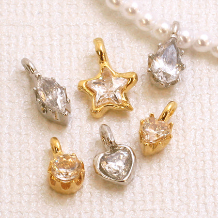 Domestic cast charm zirconia heart 1 rhodium color