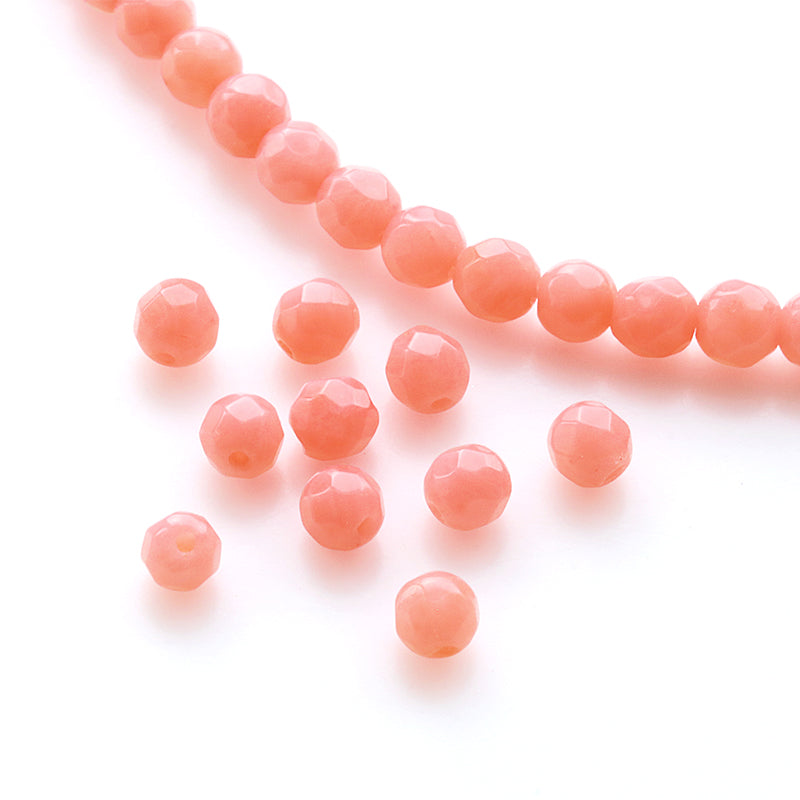 Natural stone, round cut, pink coral (dyed, natural)