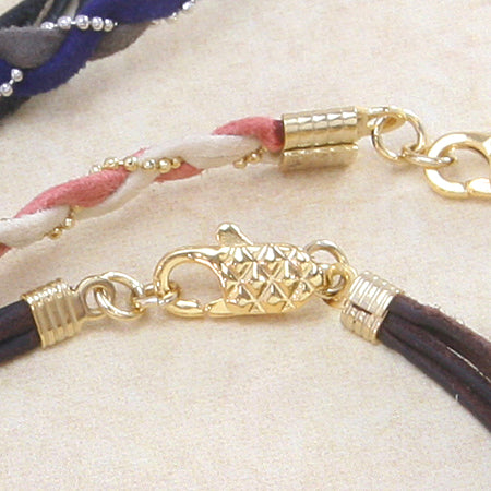 String closure with striped ring Kinkobi