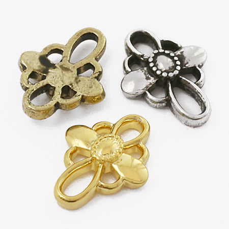Design connector cross gold