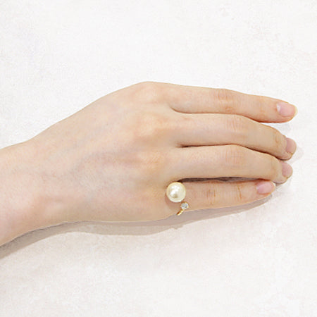 Fork ring stand with bowl on one side, gold