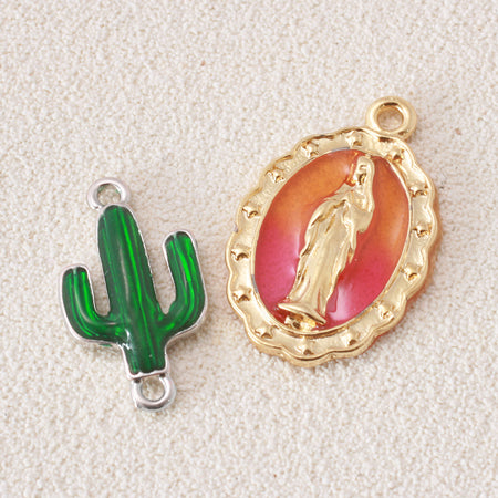 Cast charm oval Maria rhodium color