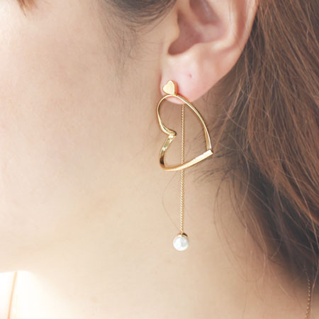 Design catch swing pearl rhodium color