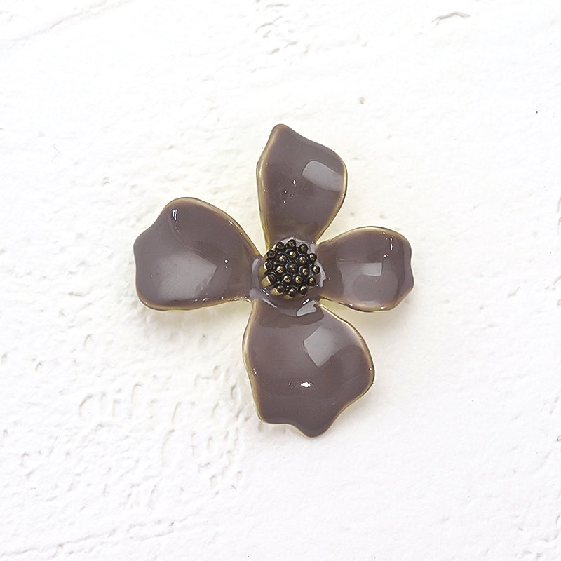 Spanish charm 4-petaled flowers with backing, gray/MG