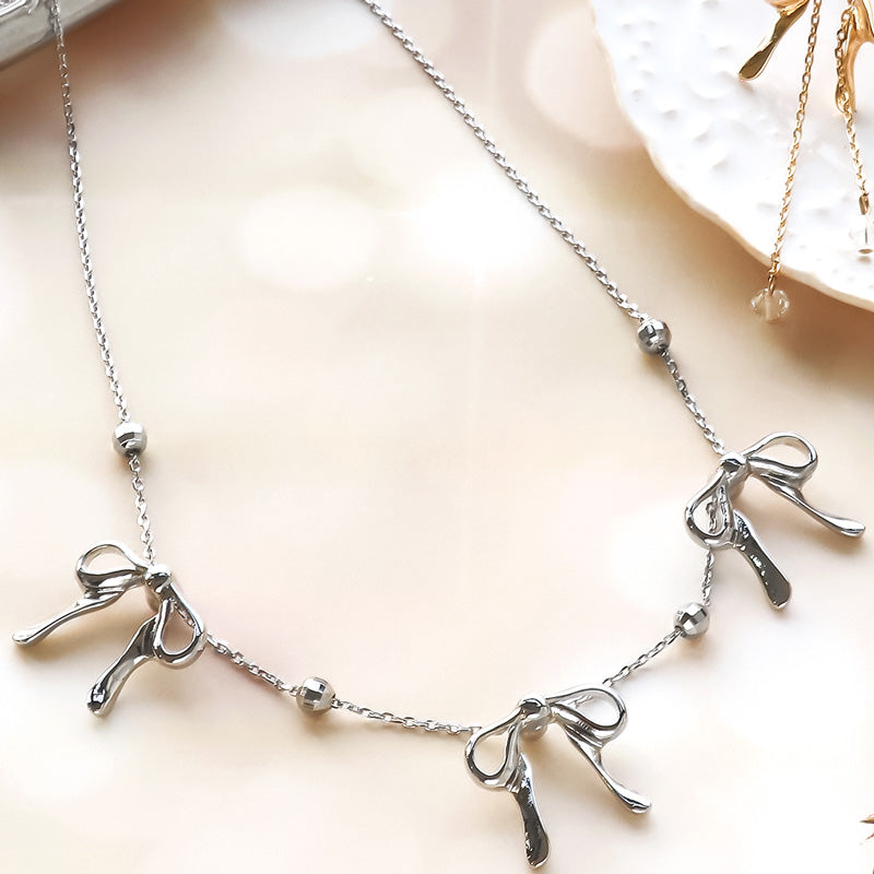 レシピNo.KR1102 スライドボール付パーツリボンのアクセサリー2種
