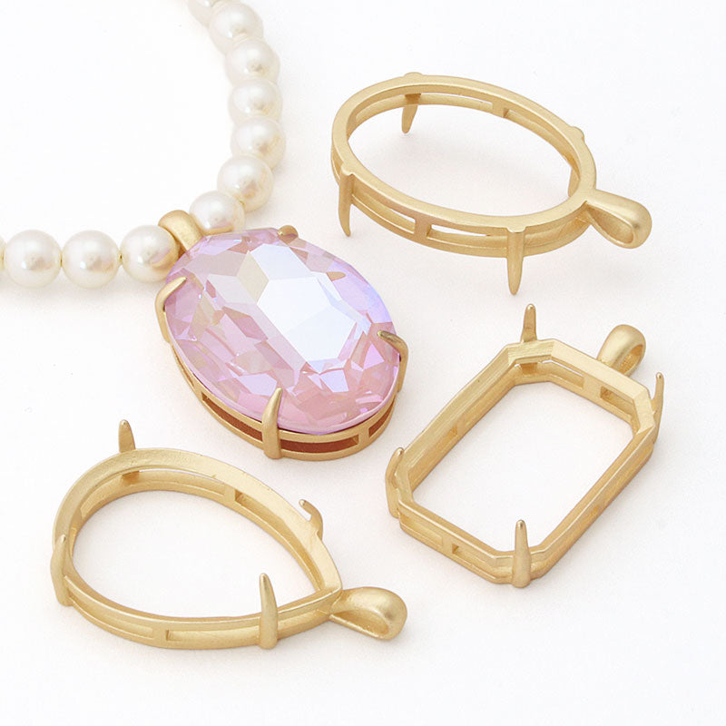 With a VaticanBezel Matt gold for oval