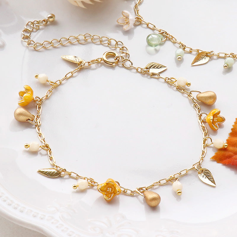 Recipe No.KR0856 Charm Kinmokusei and Ginmokusei bracelet