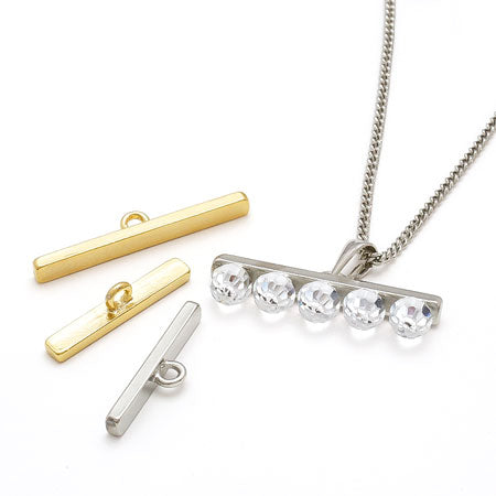 Metal parts with gold