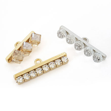 Metal parts with gold