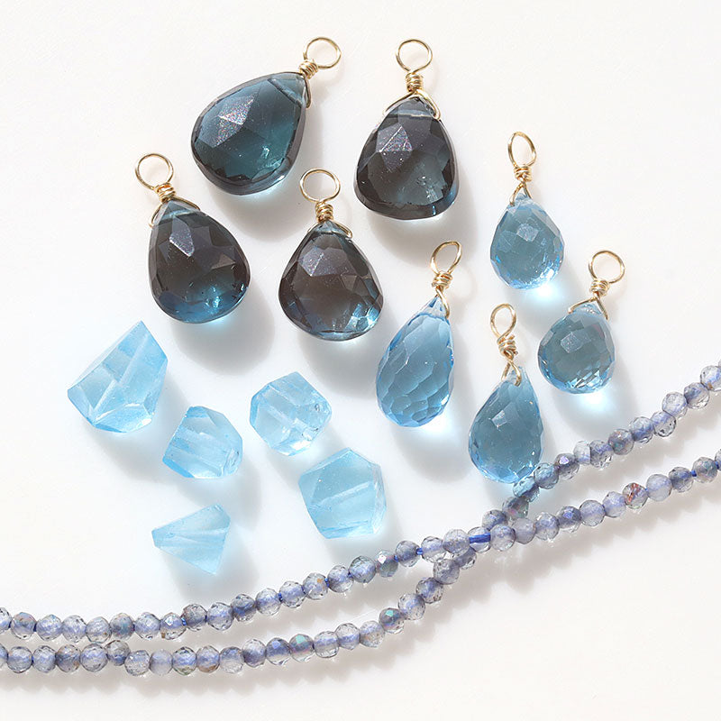 Natural stone glasses fastened charm drop cut Swiss bluetopers (natural)