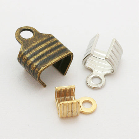 String closure with striped ring gold