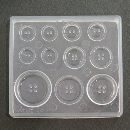 Soft mold button