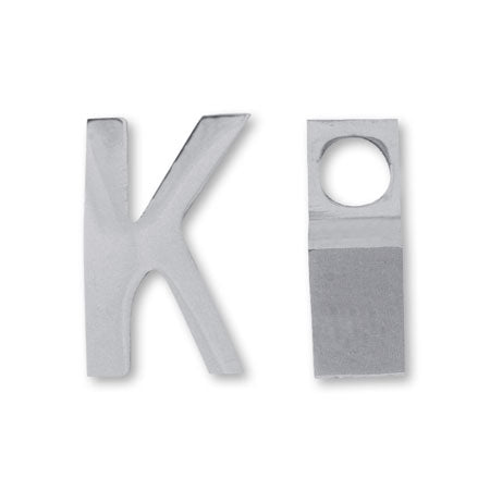 Metal part initials K stainless.