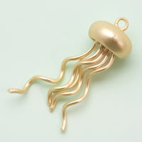 Spanish charm jellyfish mat gold