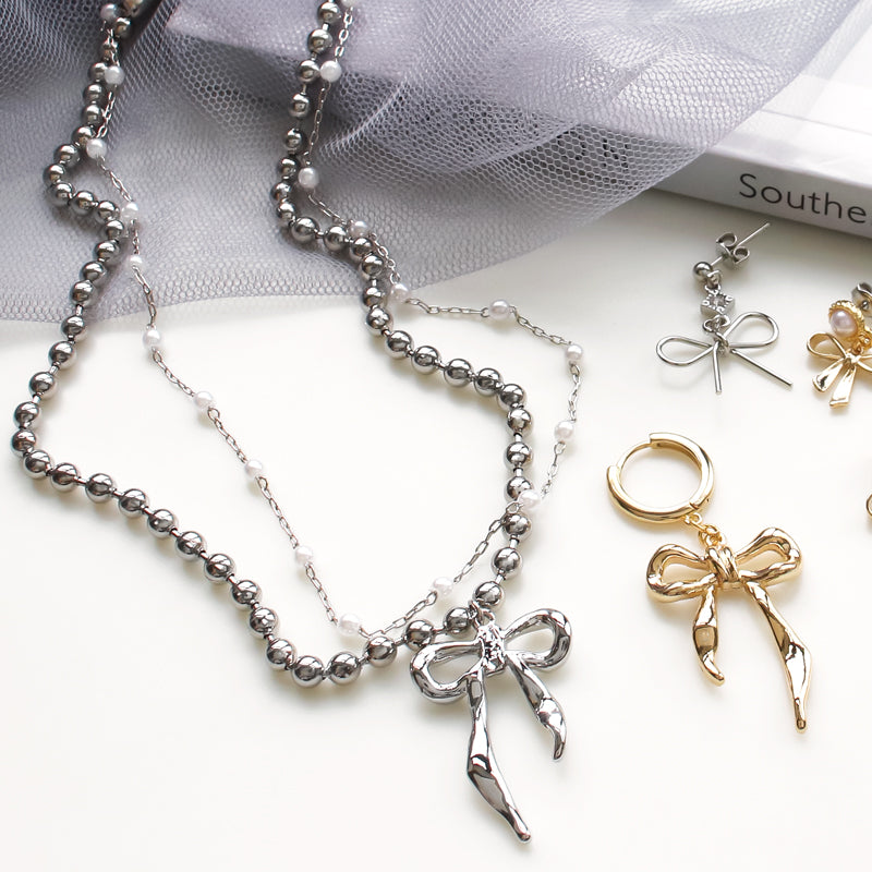 チャーム リボンNo.12 ゴールド – 貴和製作所オンラインストア