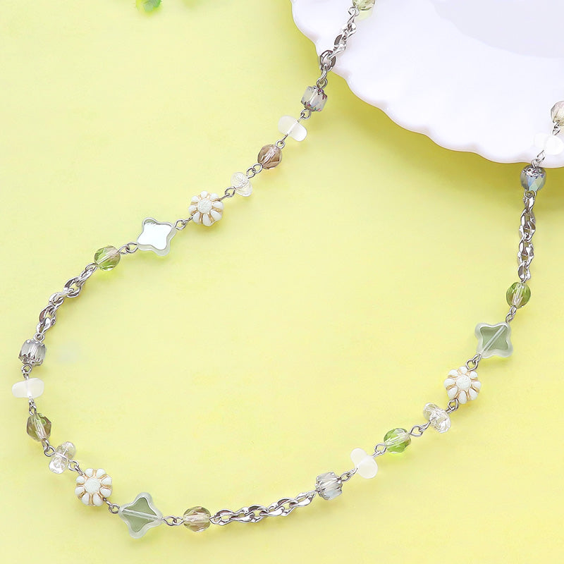 Czech table cut 4-petal flower crystal viridian mat