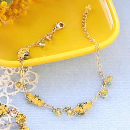 レシピNo.KR1325　チャームミモザと貴和クリスタルのブレス＆ブローチ