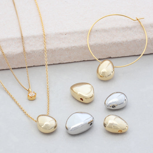 メタルビーズ シズク 横穴 ロジウムカラー – 貴和製作所オンラインストア